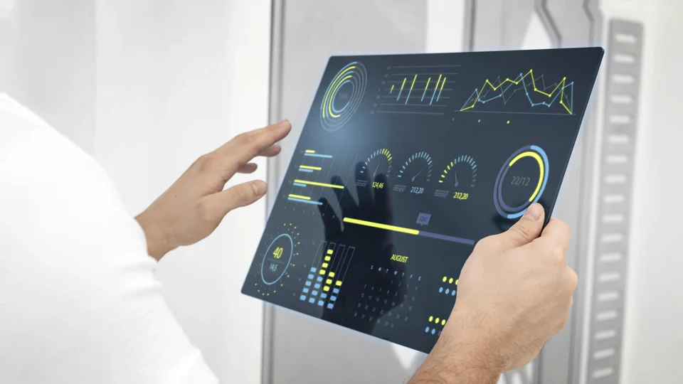Reviewing business charts on a tablet